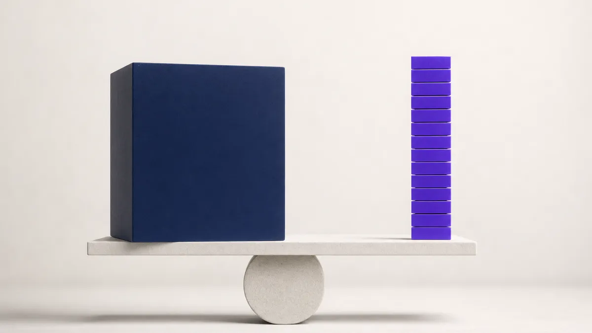 Near-white abstract of one solid ink-navy block balanced against a slender column of stacked violet segments, full-time cost against fractional slices